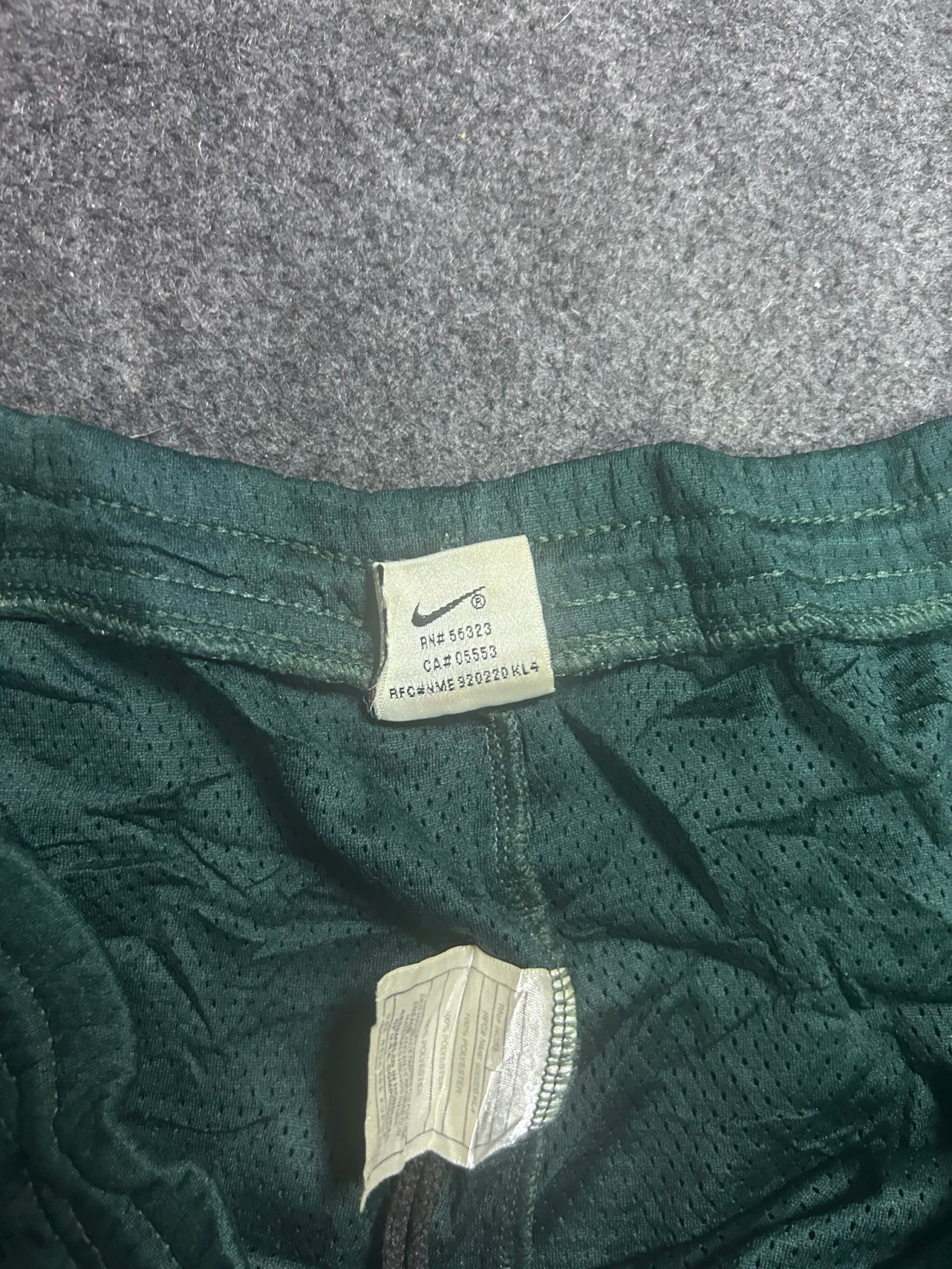 Nike thrift shorts India close-up