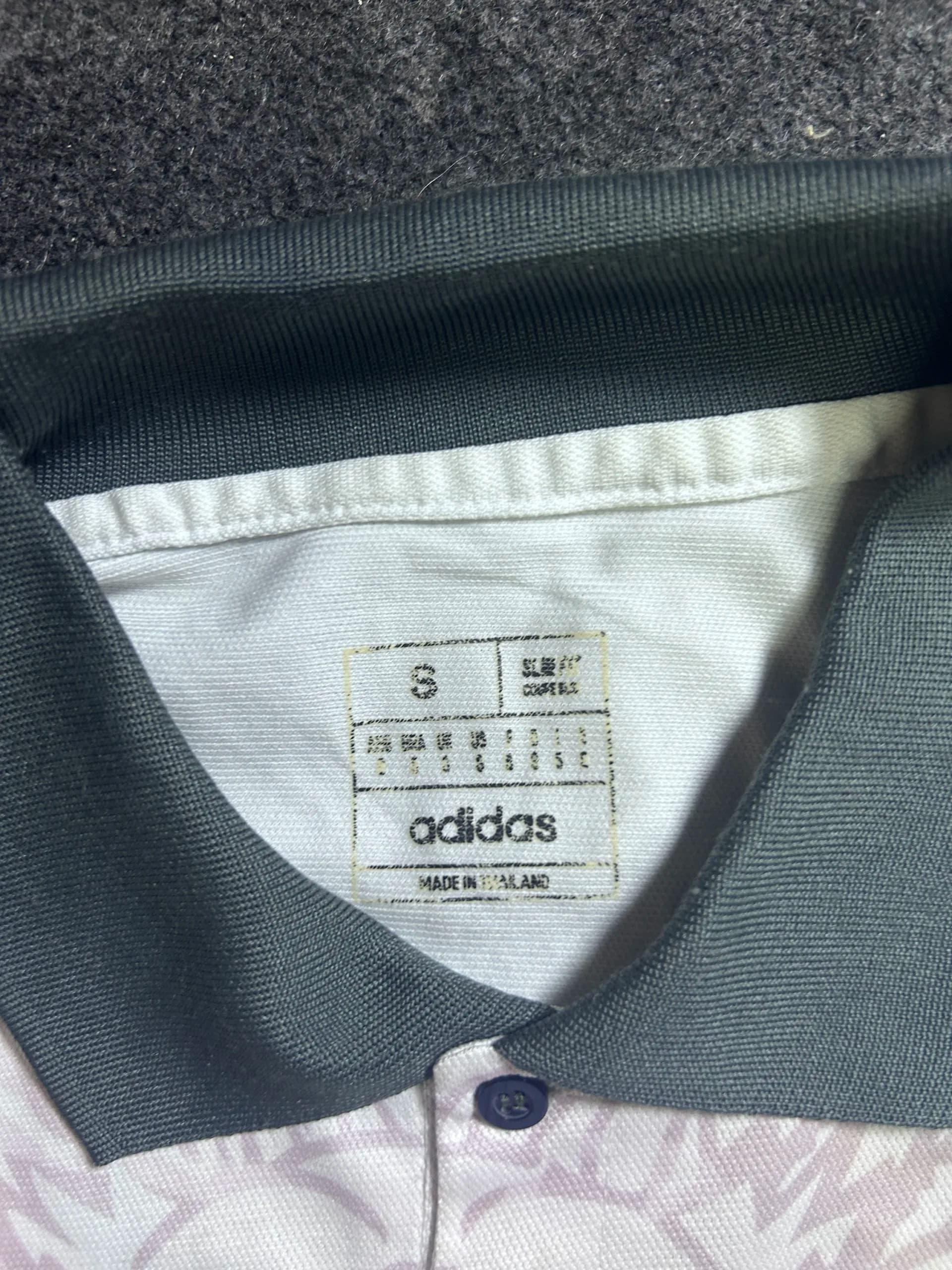Adidas thrift polo shirt India close-up