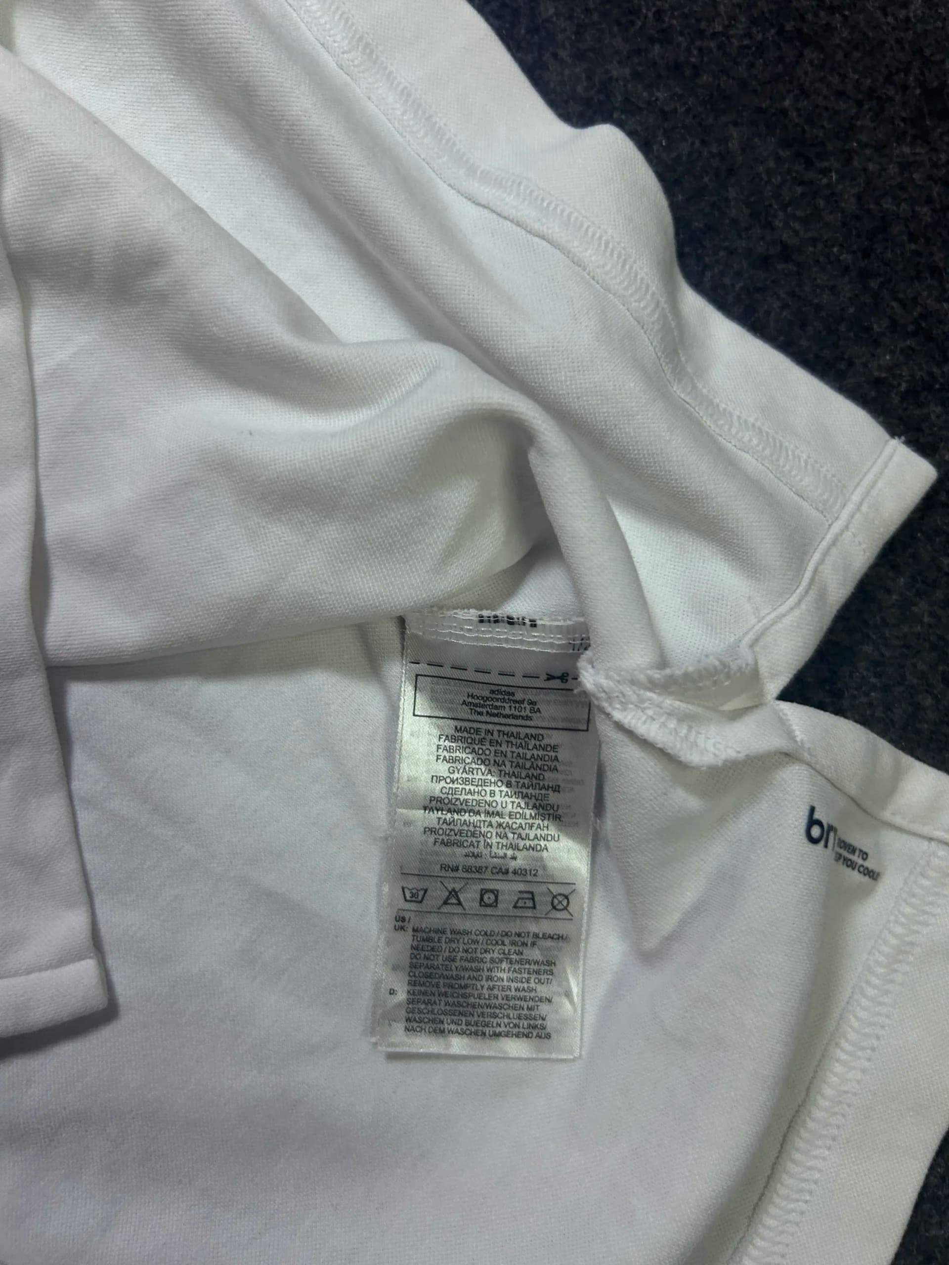 Adidas thrift polo shirt India close-up