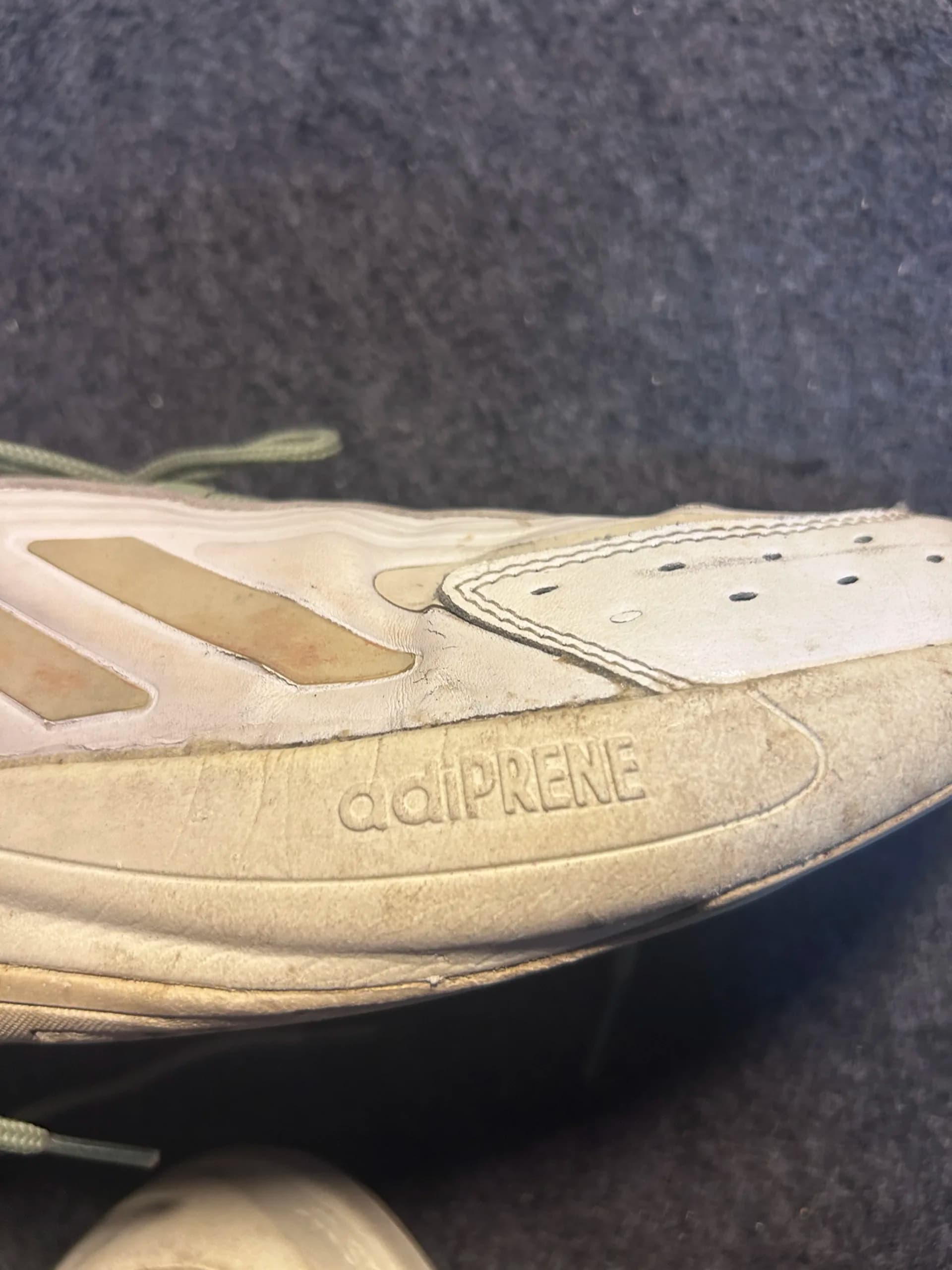 Adidas thrift sneakers India close-up