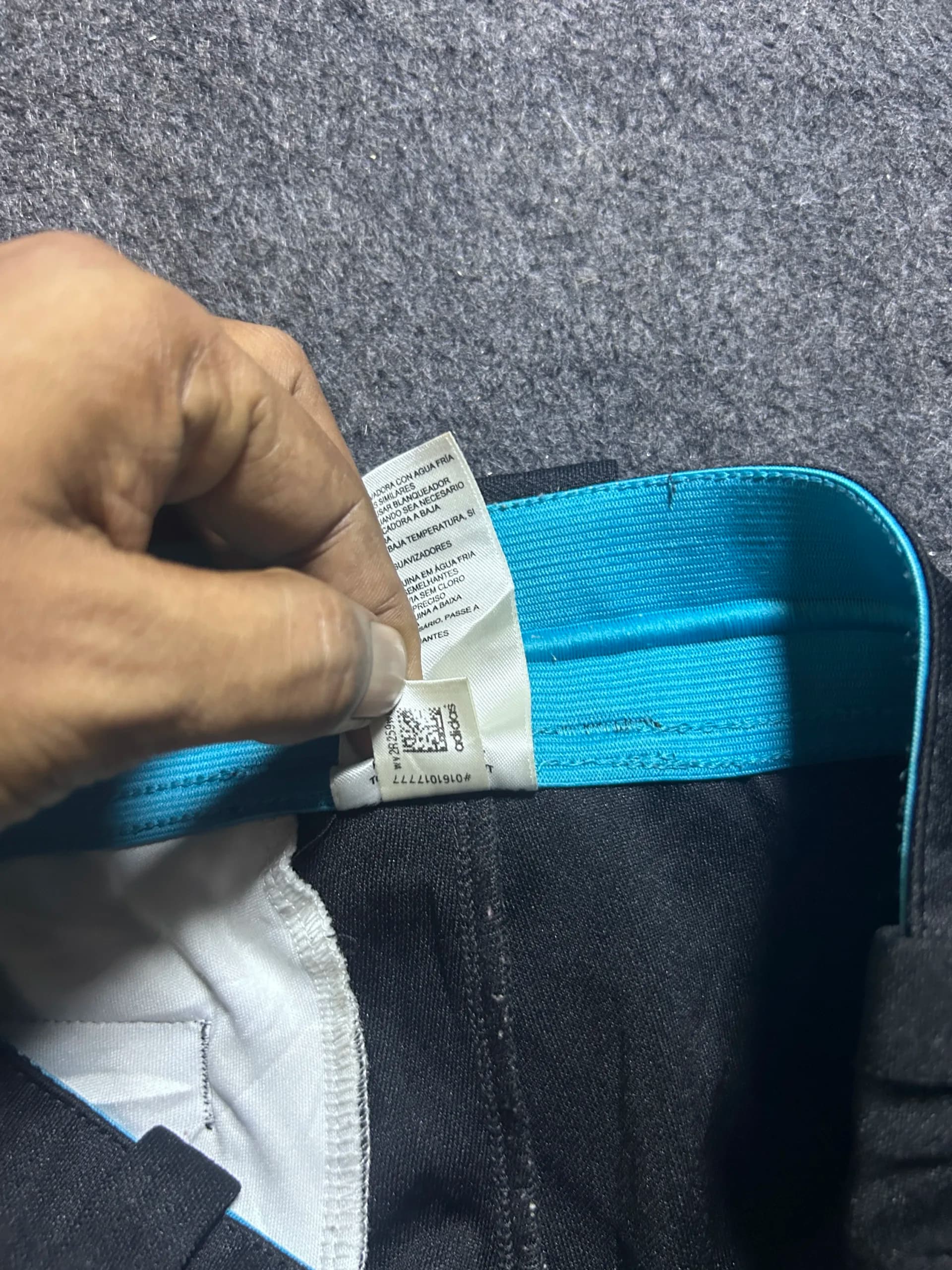Adidas thrift shorts India close-up
