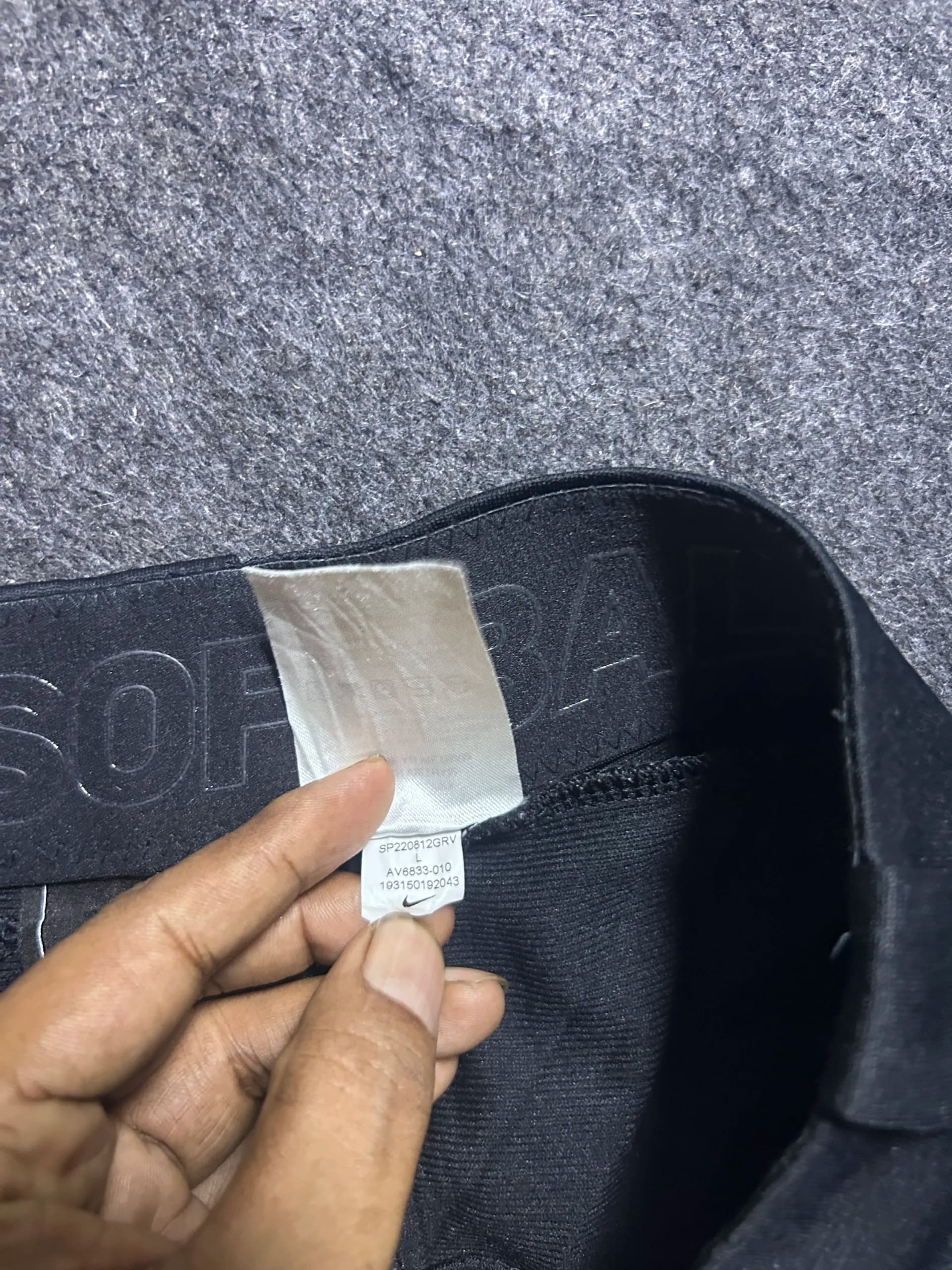 Nike thrift shorts India close-up