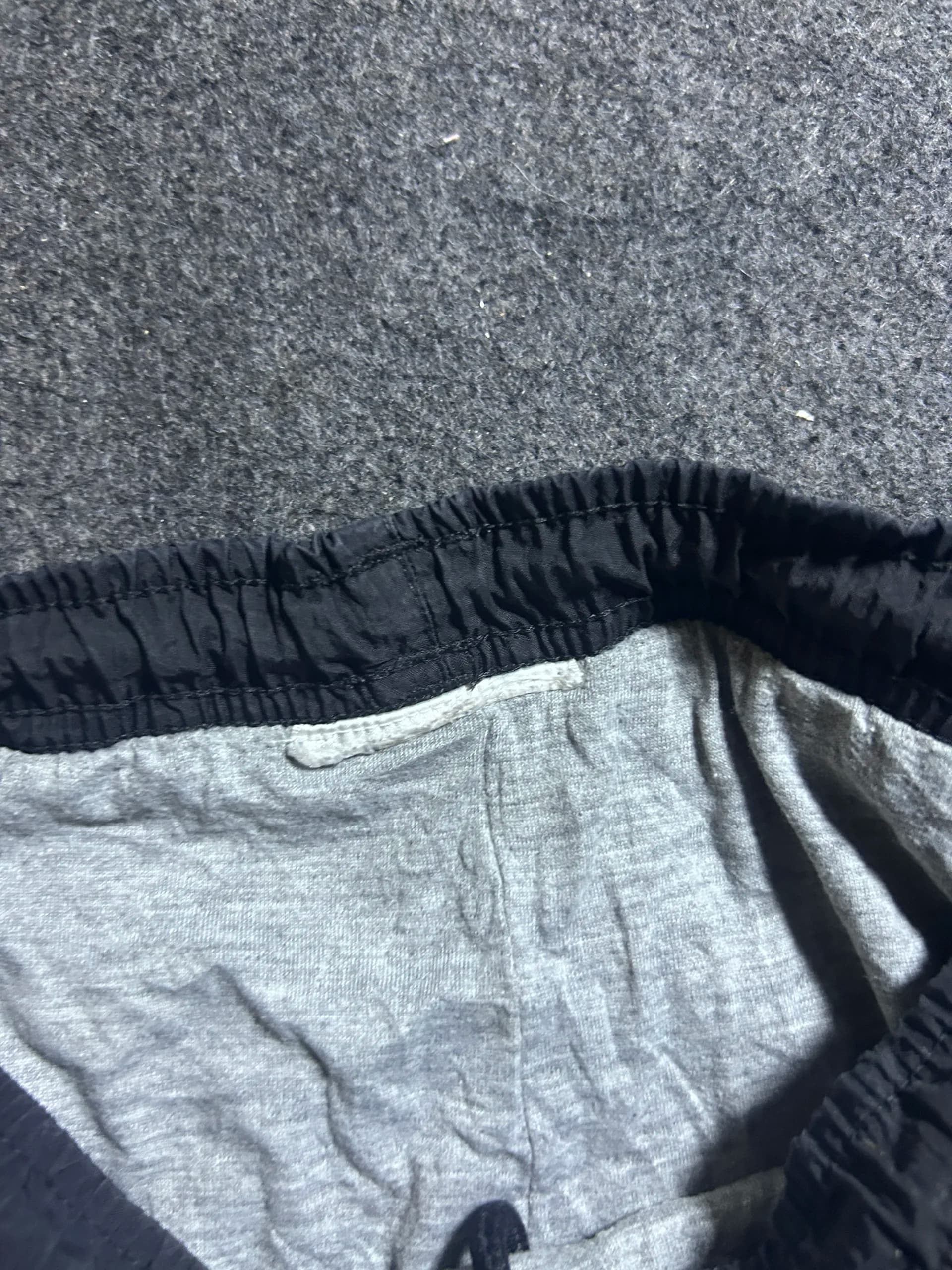 Adidas thrift track pants India close-up
