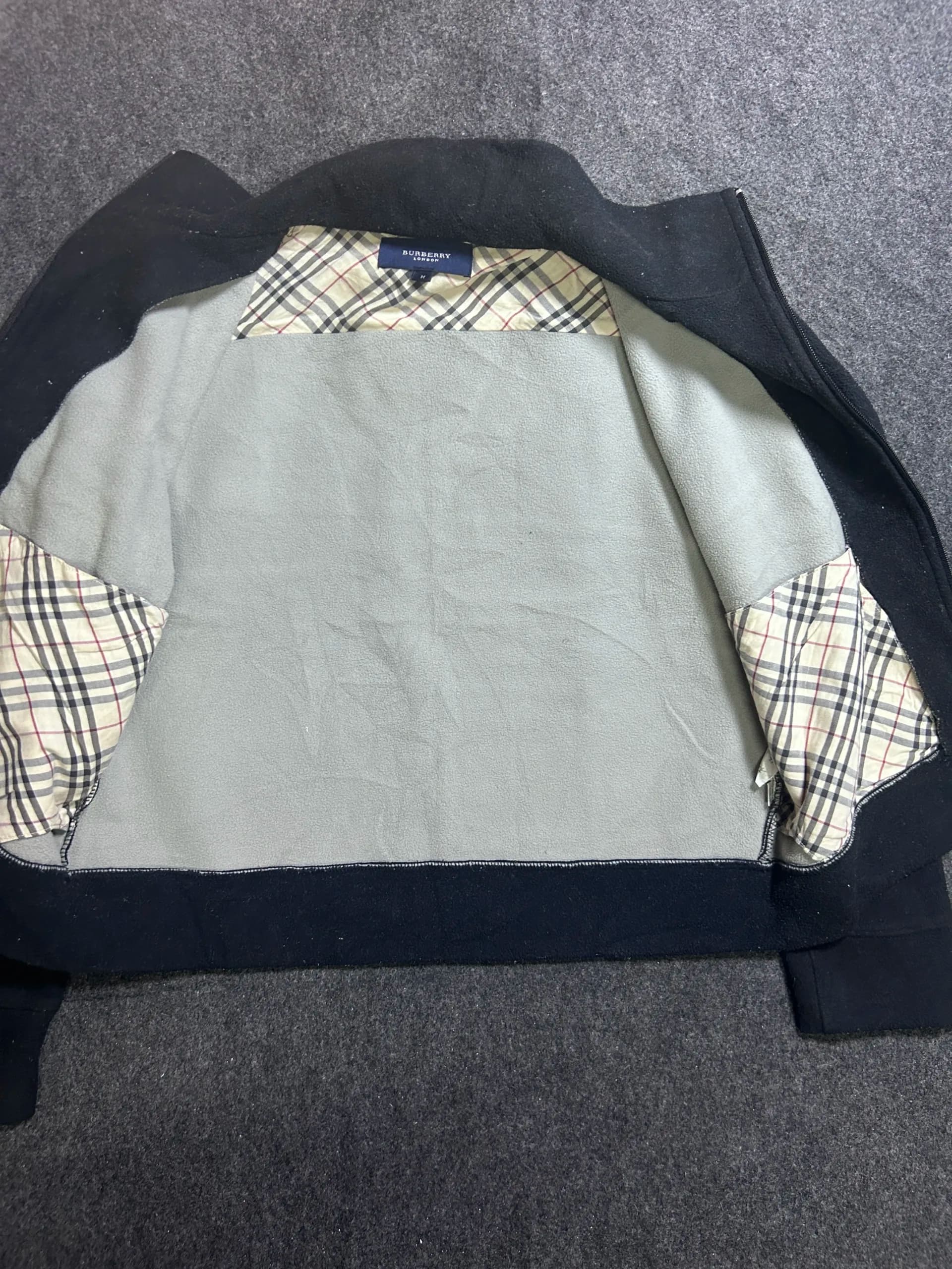 Branded thrift fleece jacket India detail view