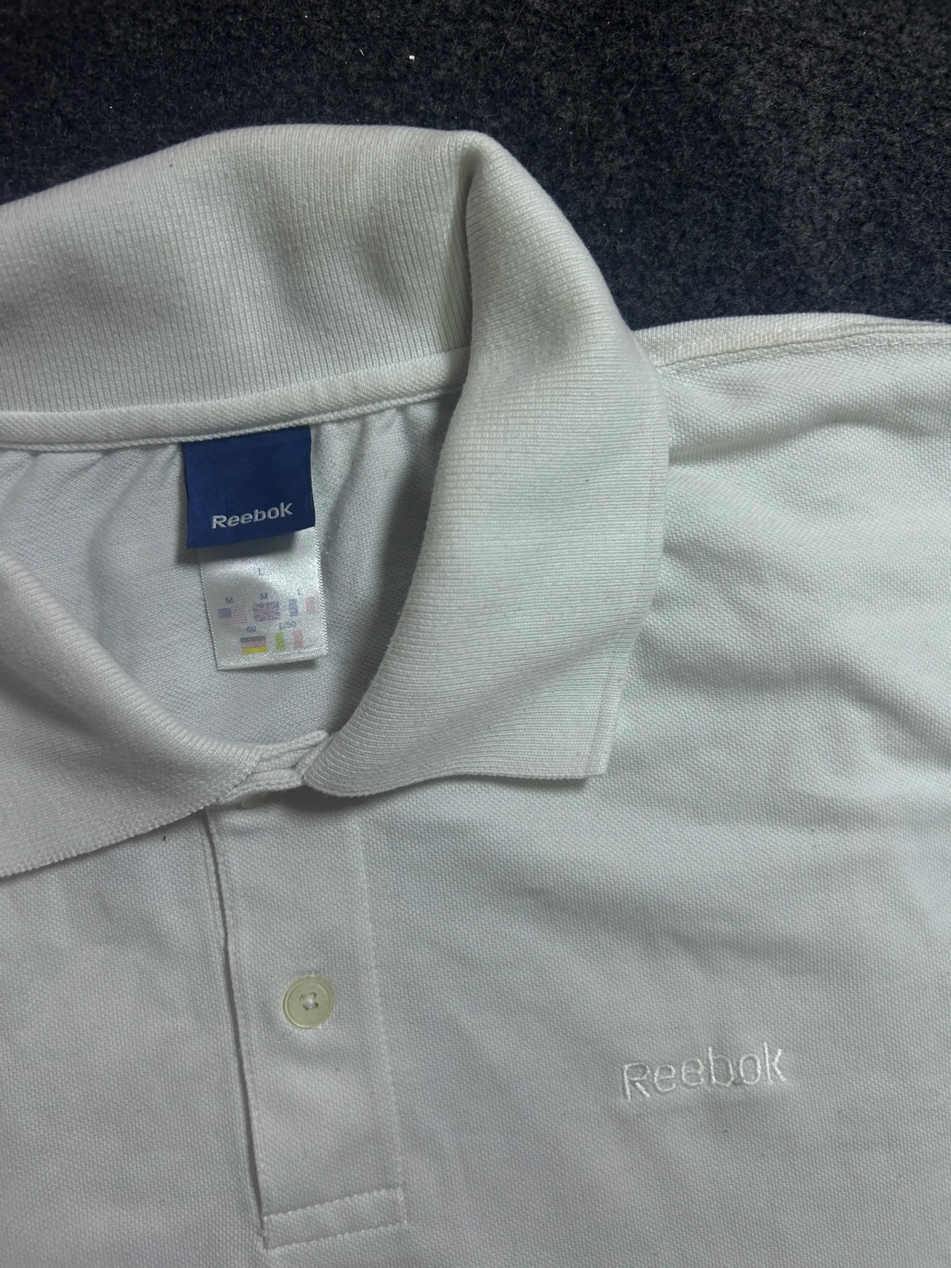 Reebok thrift polo shirt India detail view
