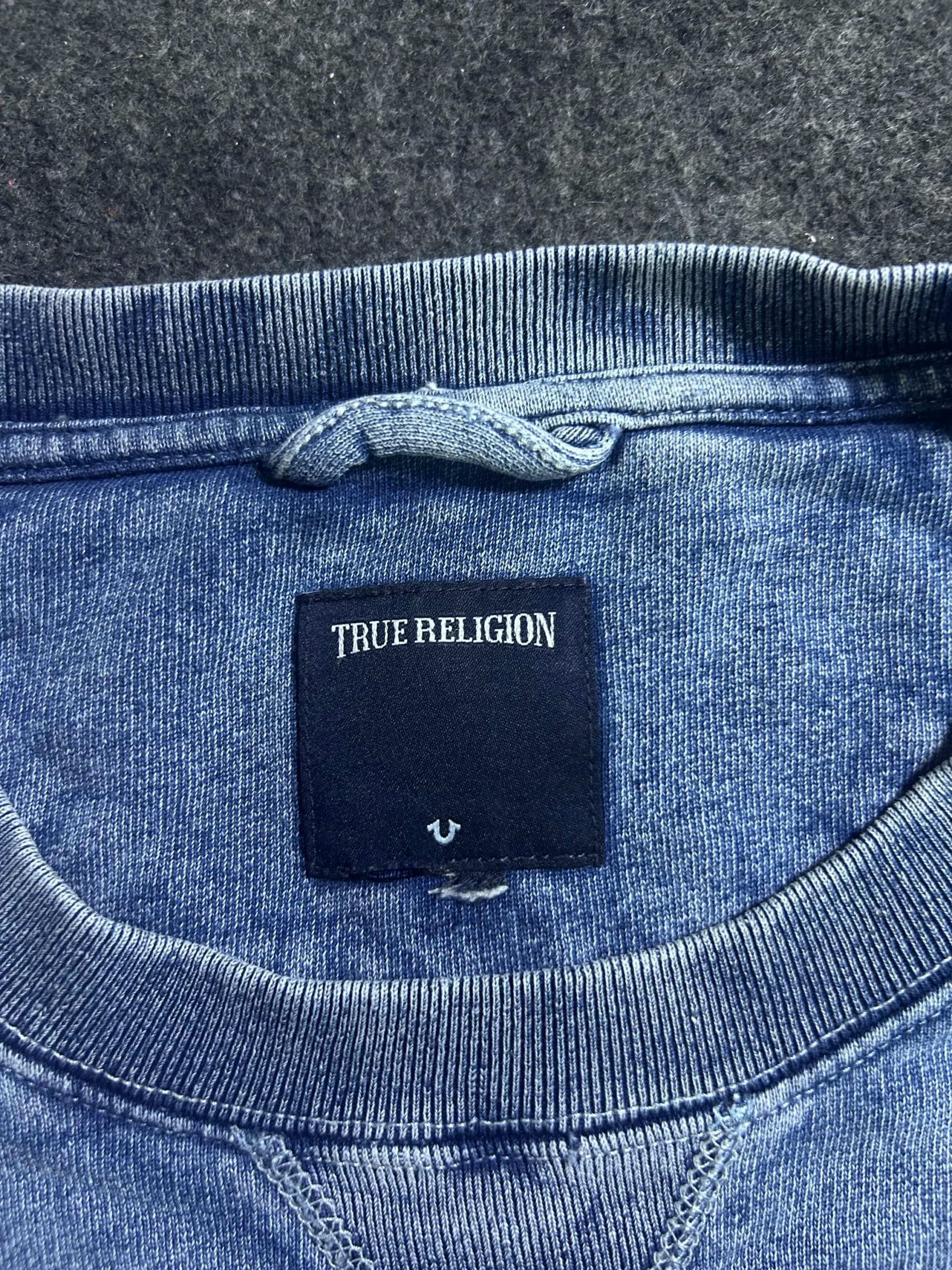 Branded thrift sweatshirt India close-up