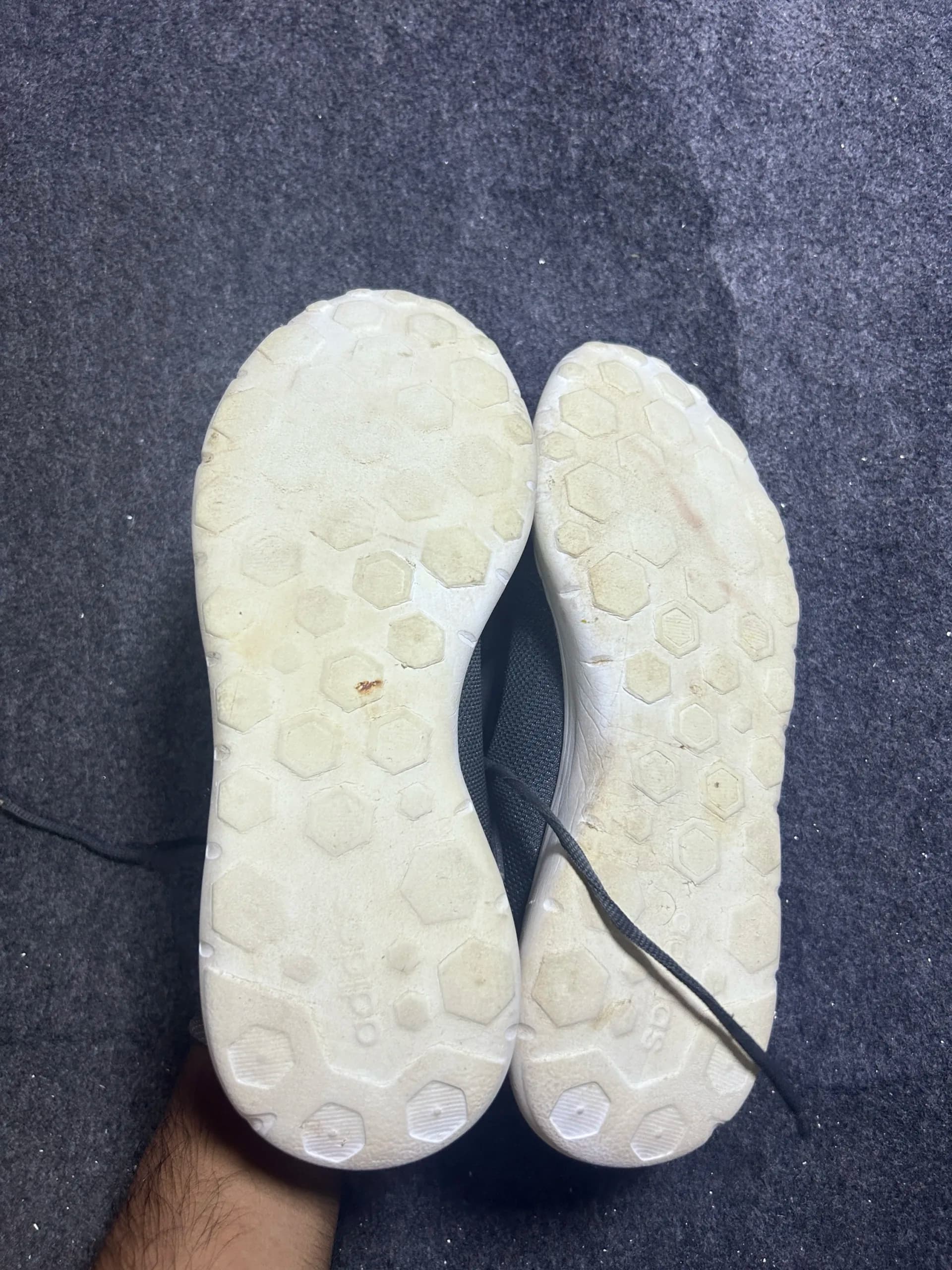 Adidas thrift sneakers India close-up