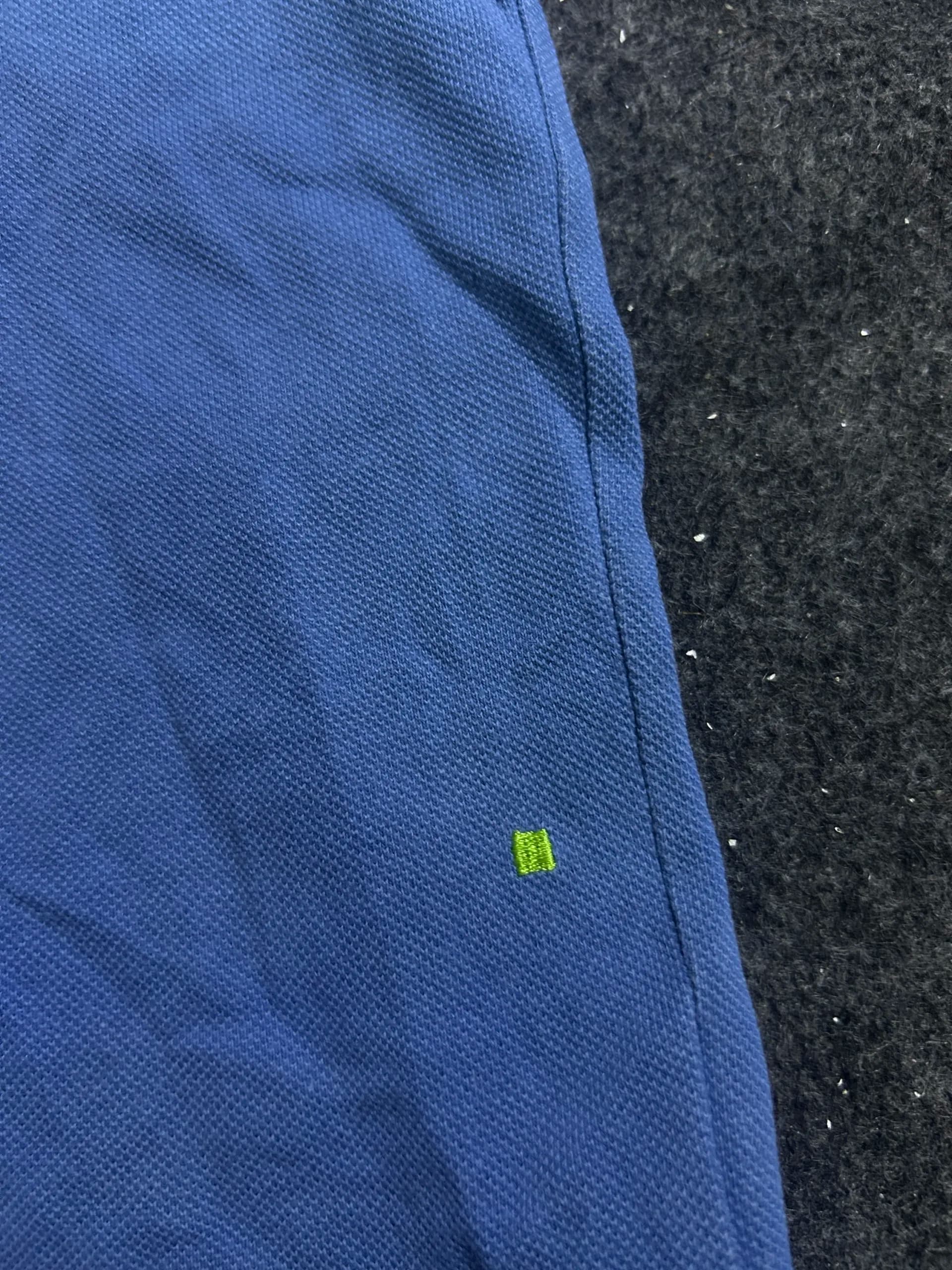 Branded thrift polo shirt India close-up