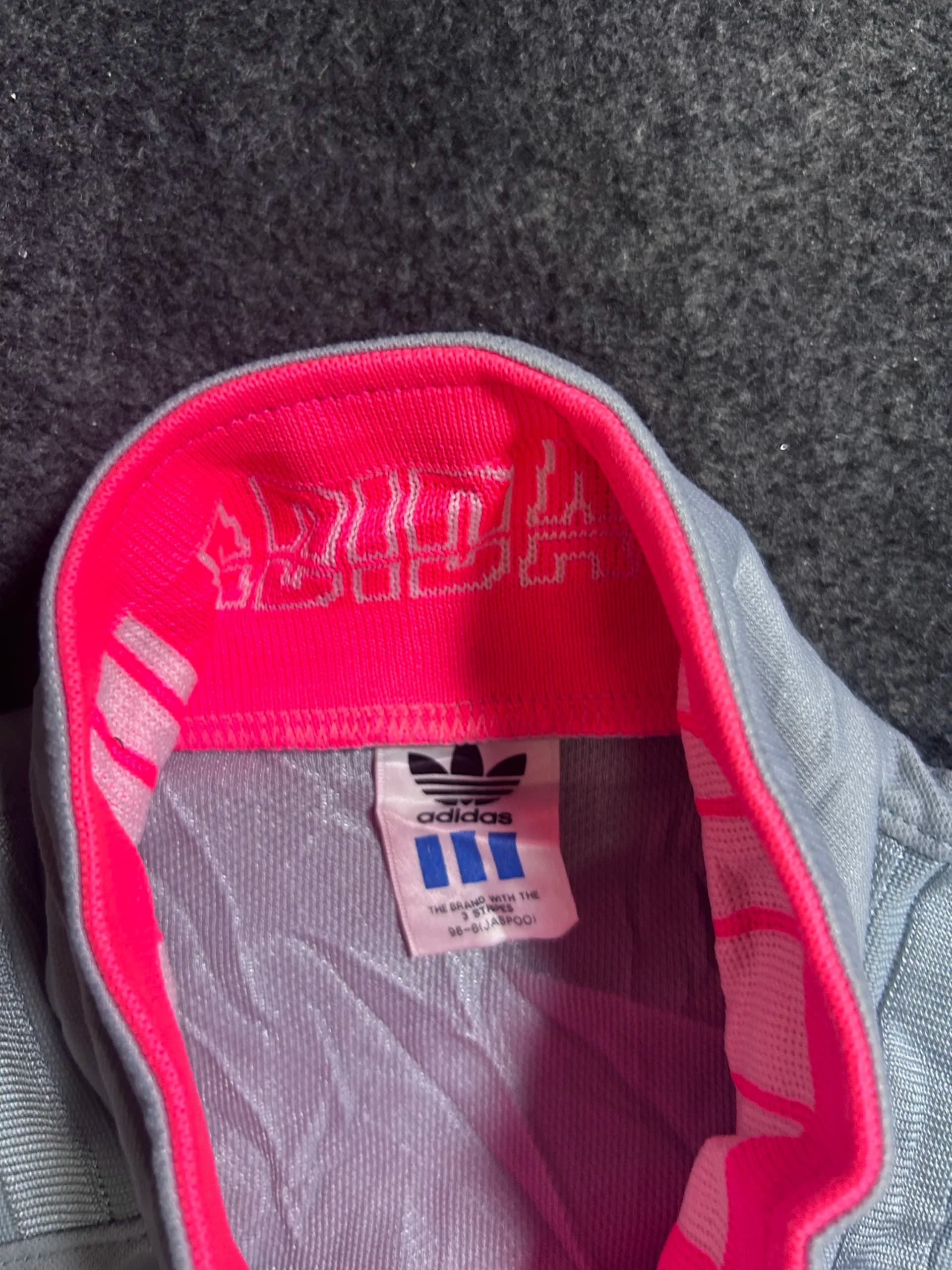 Adidas thrift track jacket India close-up