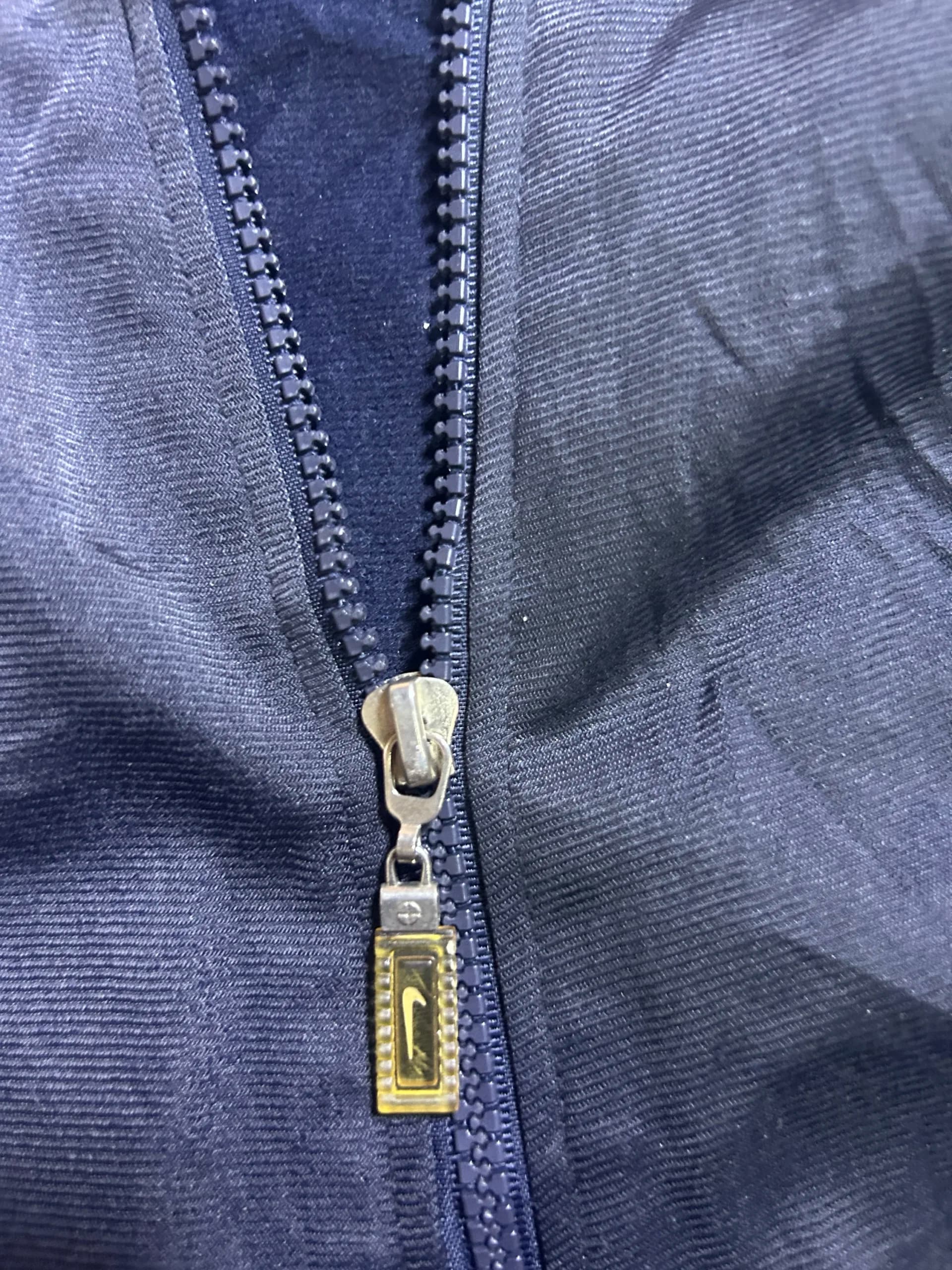 Nike thrift track jacket India close-up
