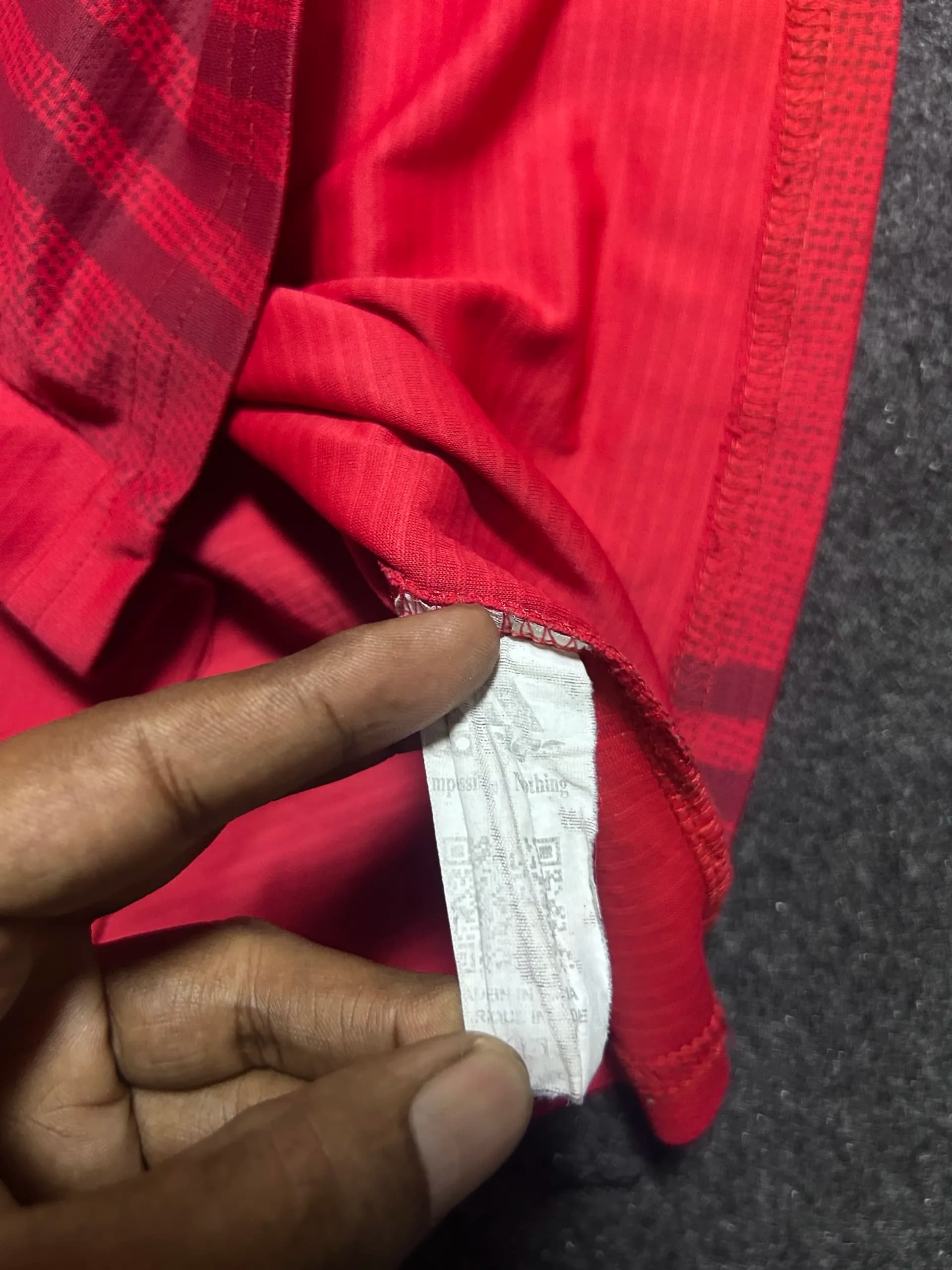 Adidas thrift t-shirt India close-up