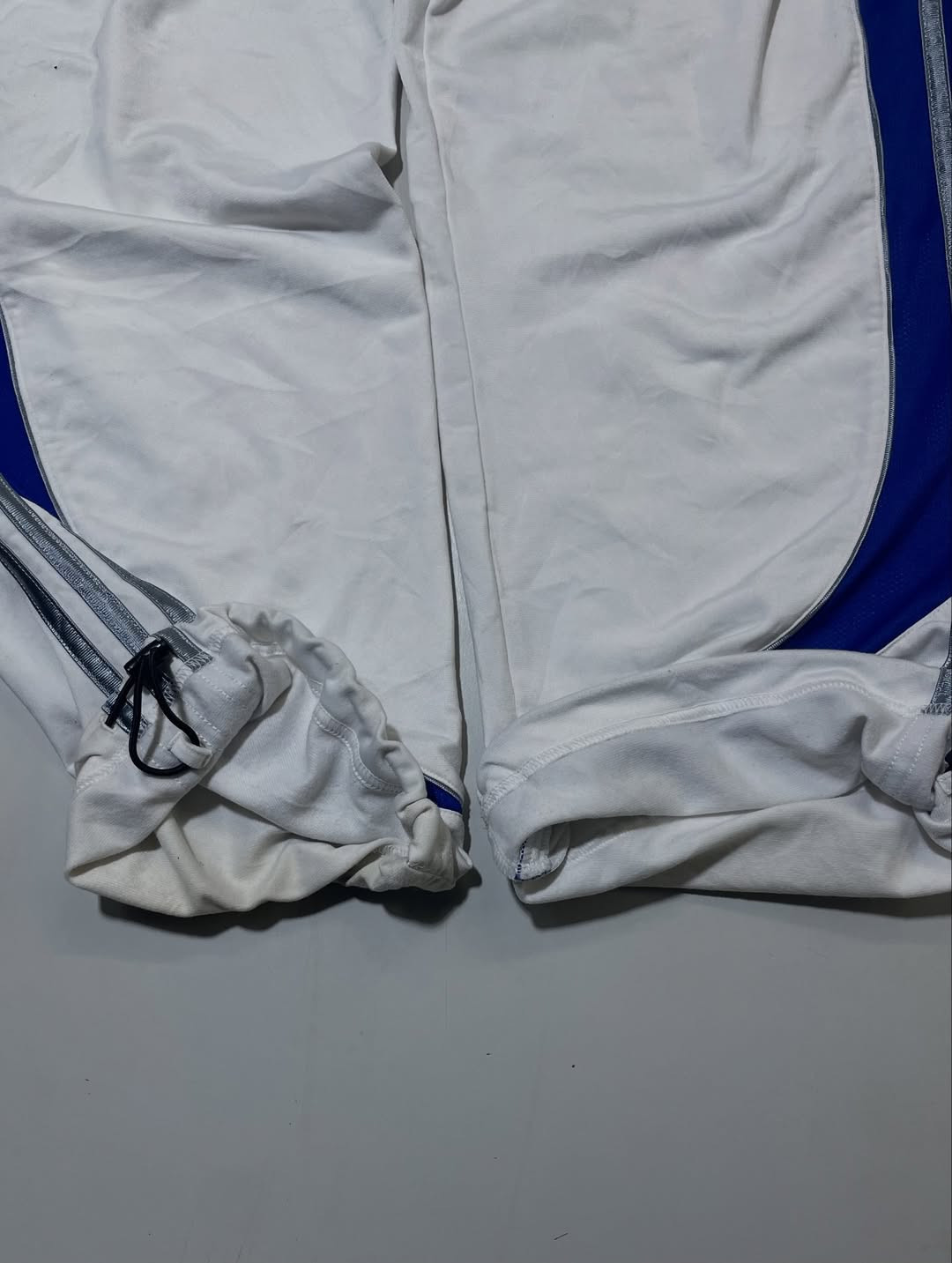 Adidas white with blue strips track pant size M