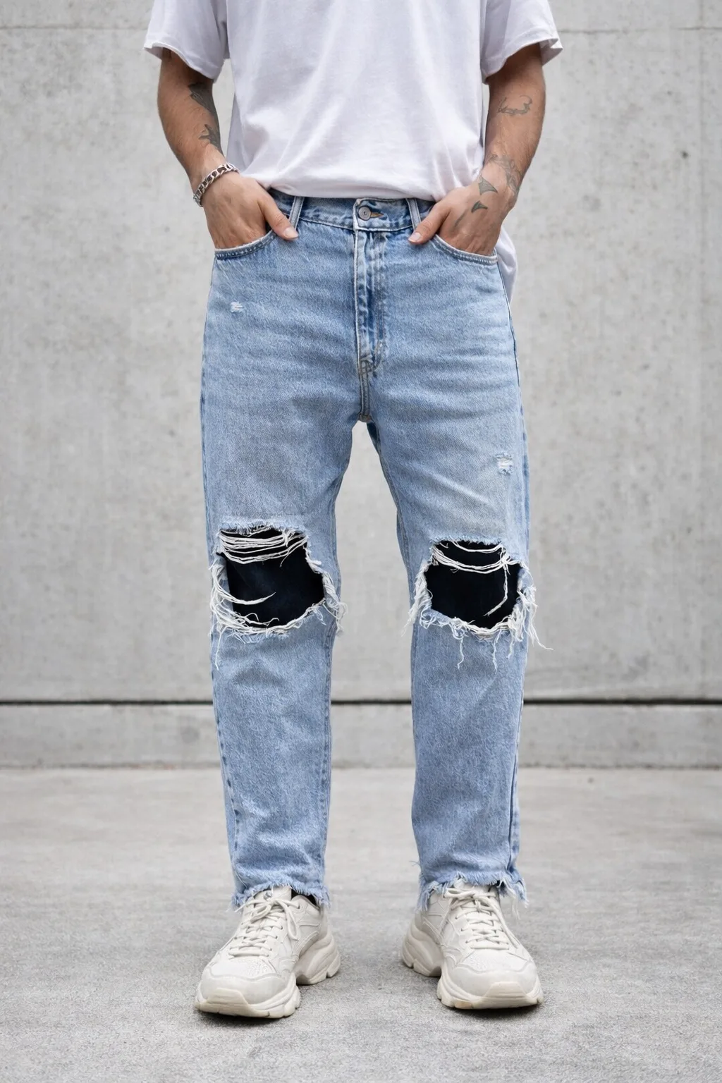 Levi’s Light Wash Distressed Denim Jeans Ripped Knees | Vintage Fade | 36 | Unisex
