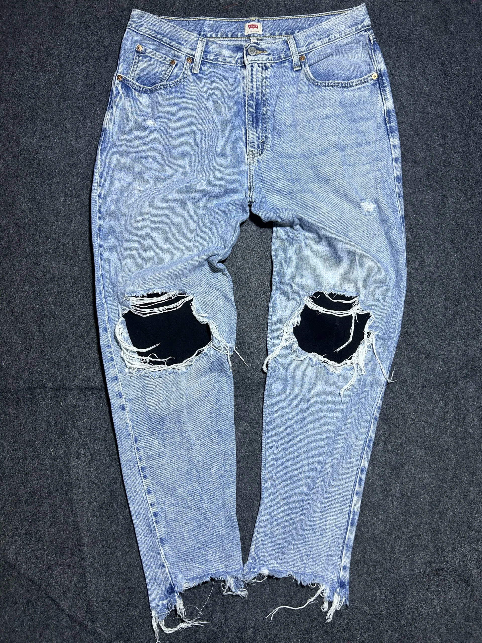 Levi’s Light Wash Distressed Denim Jeans Ripped Knees | Vintage Fade | 36 | Unisex