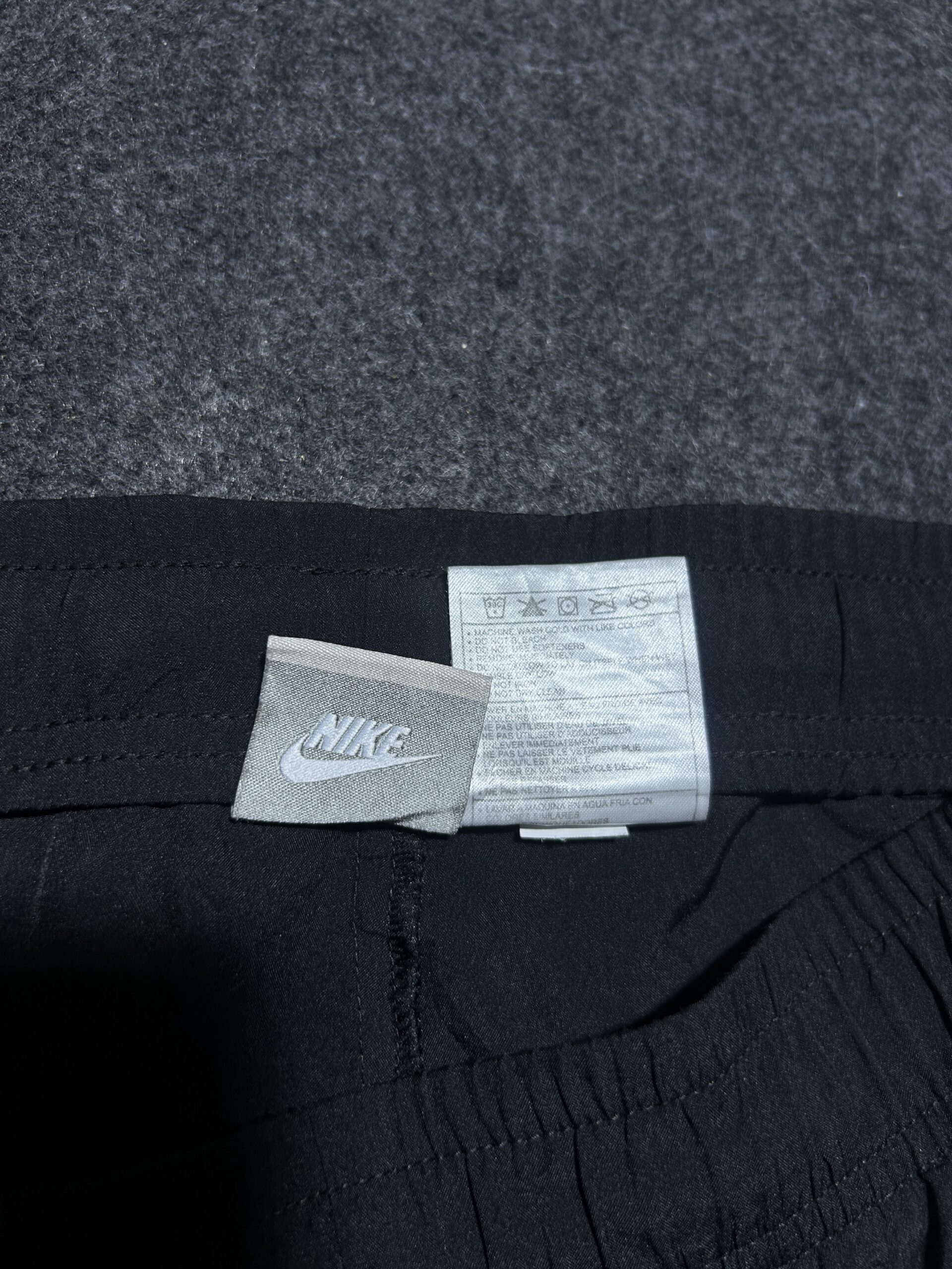 Nike Black Track Pants with Pink & Grey Side Panels | 32-38