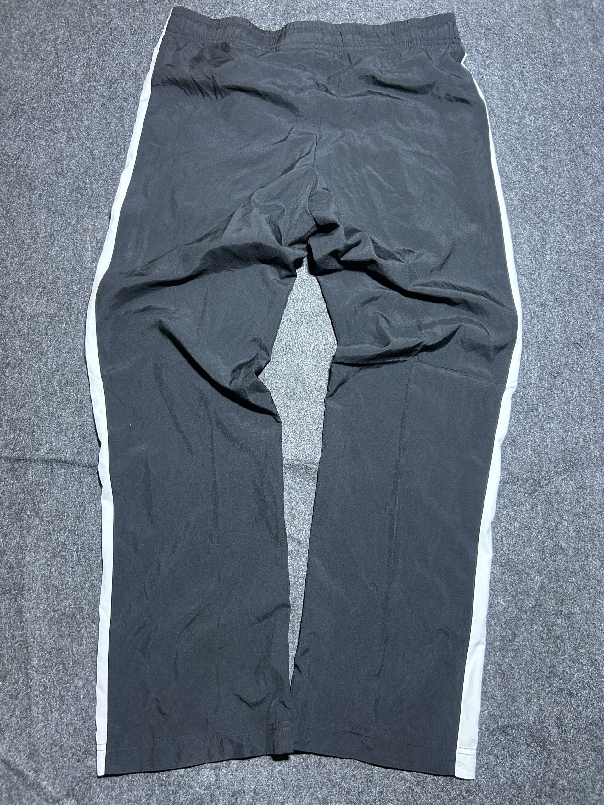 Nike Black Track Pants with Pink & Grey Side Panels | 32-38