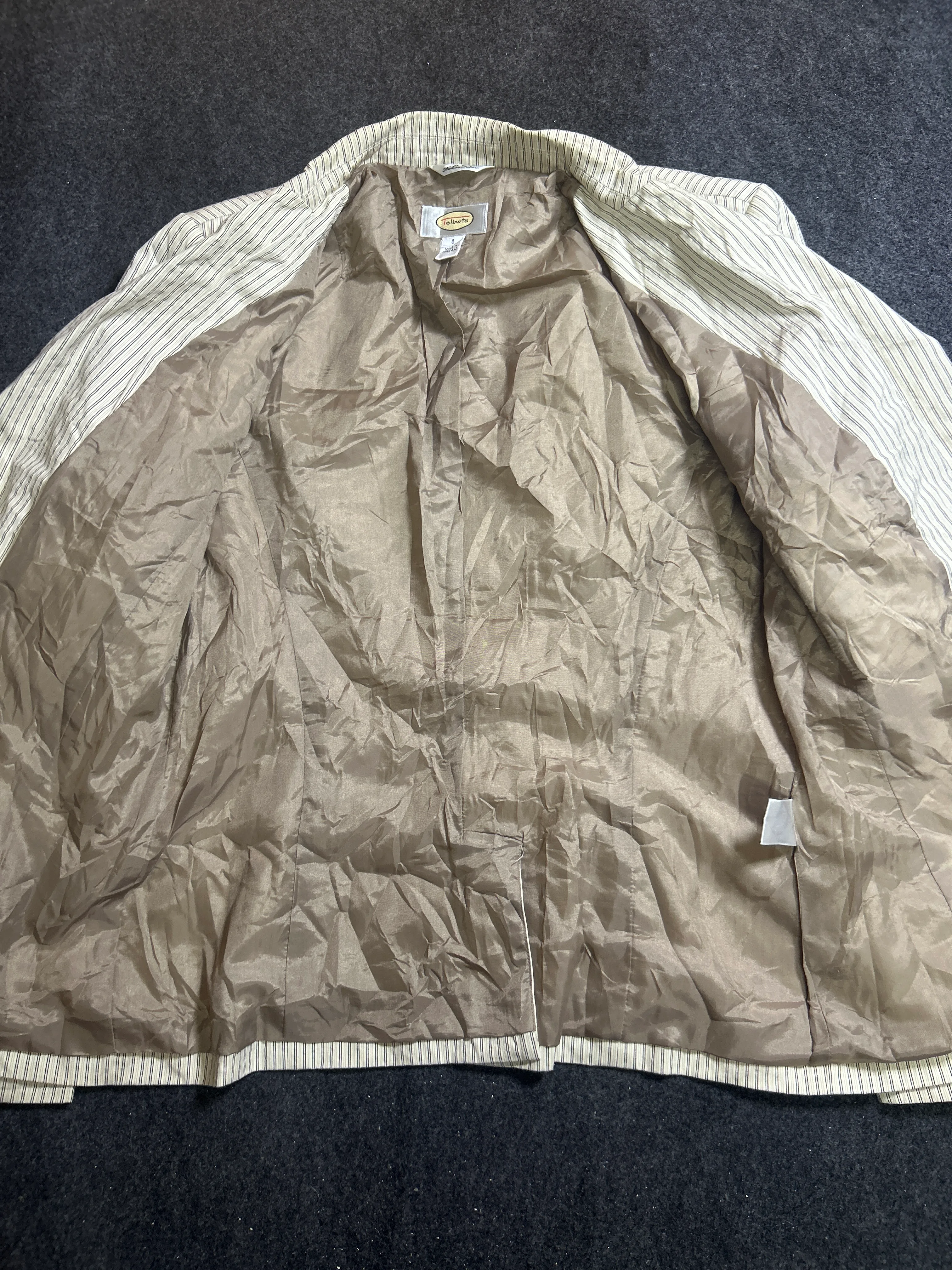 Coat thrift clothing India close-up