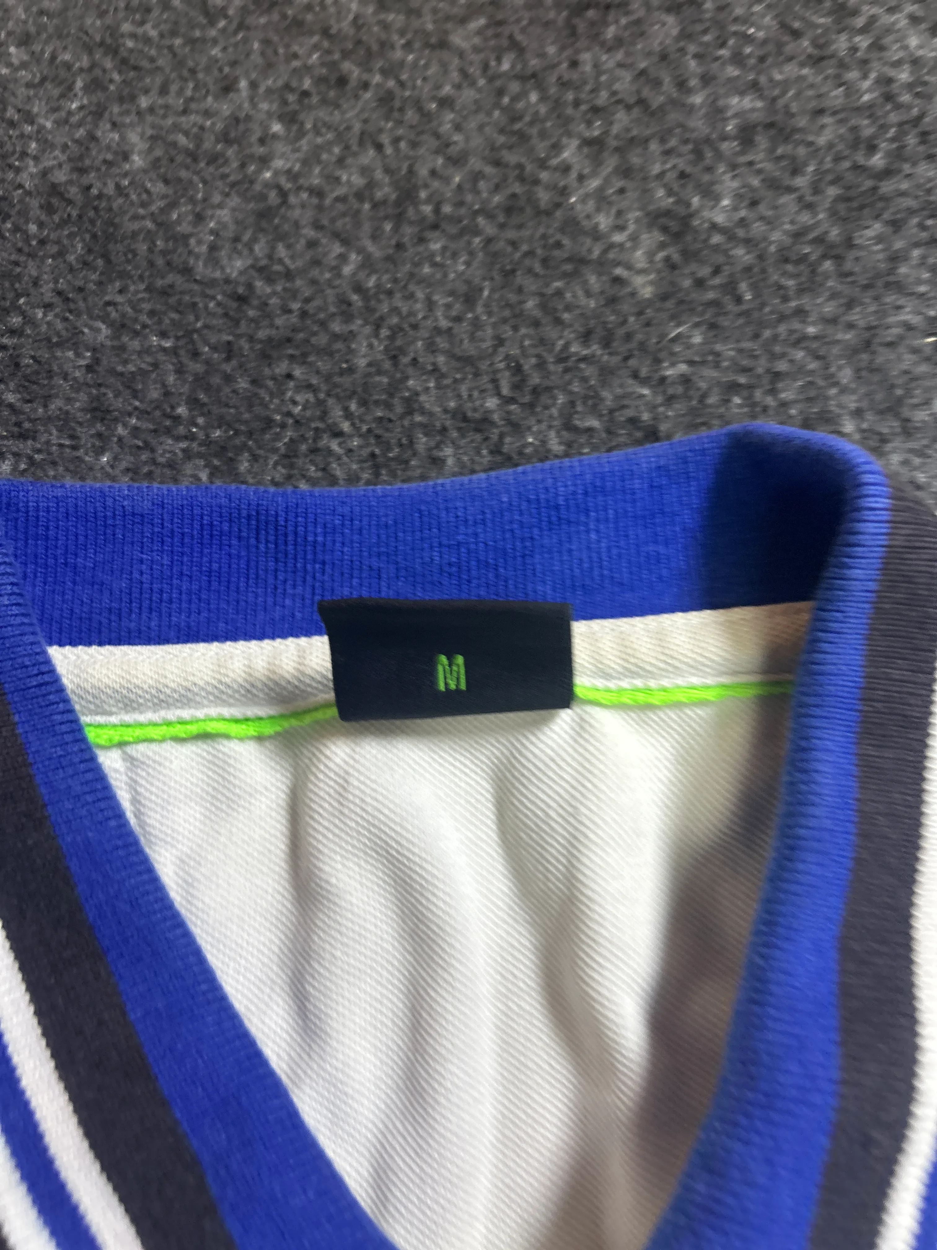 Branded thrift polo shirt India close-up
