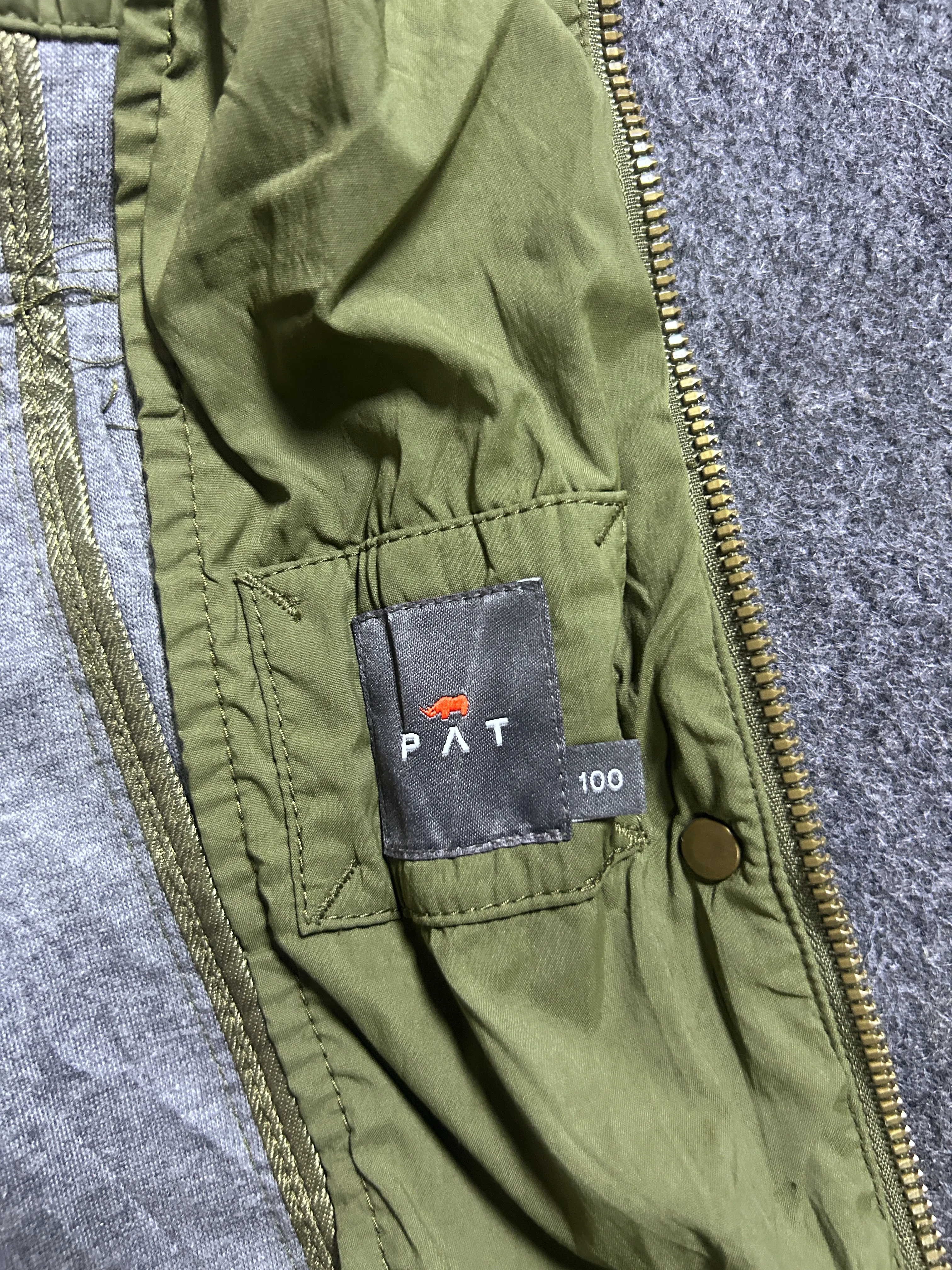 Branded thrift parka jacket India close-up