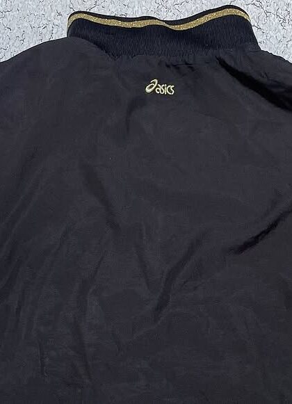 asics women jacket black and gold