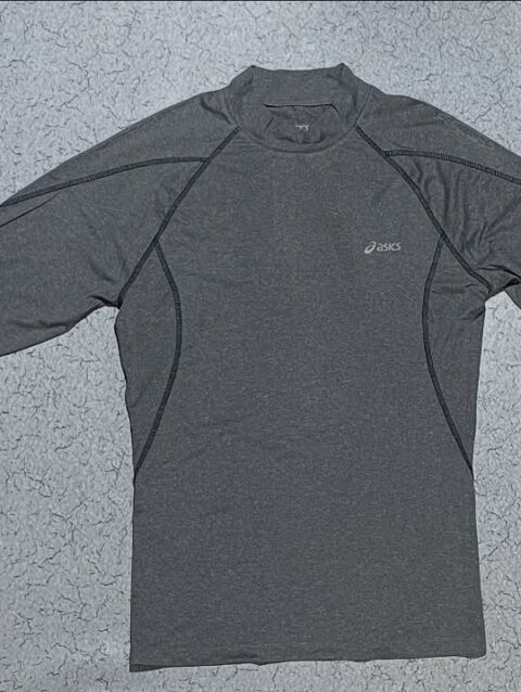 Asics core compression high neck tshirt for gym and sports size S to L

Chest 32...