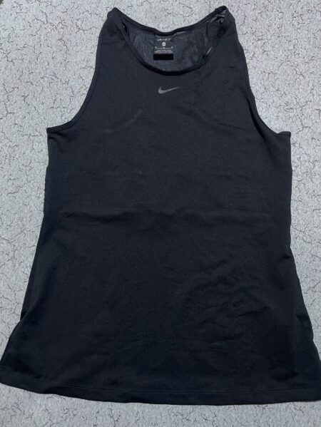 Ni** pro dry fit stretchy size S condition like new Chest

Chest 32-34 
Length 3...