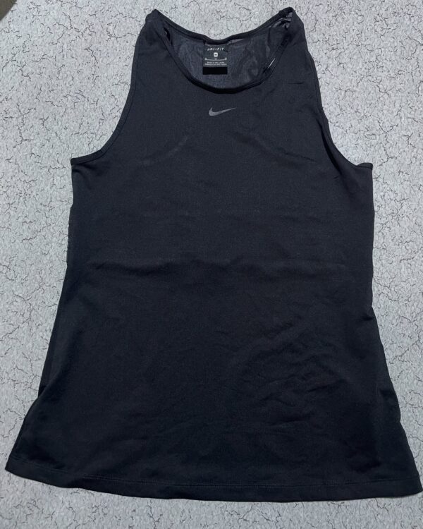 Ni** pro dry fit stretchy size S condition like new Chest

Chest 32-34 
Length 3...