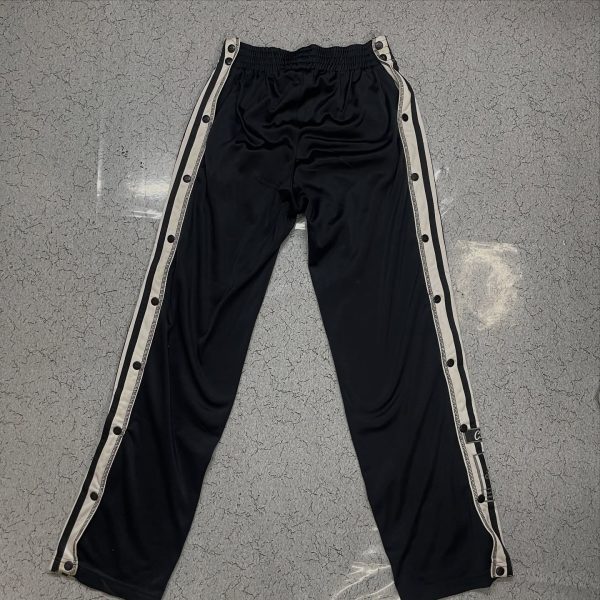 SOLD  

Vintage button track pant

Waist 26 to 32

Length 39

Thighs 11

Some si...