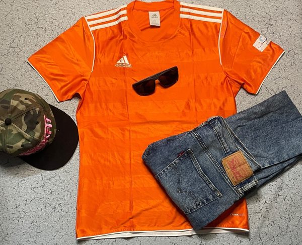 Wear this shining orange jersey and impress without stress

Size M chest 38-40