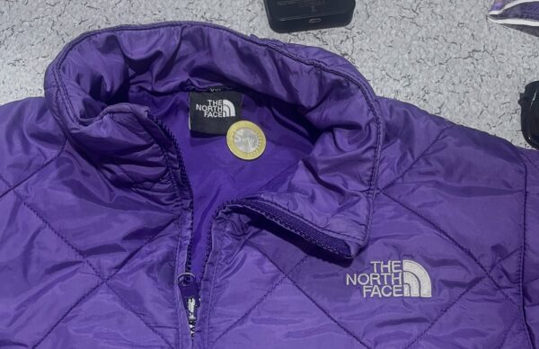 The north face puffer jacket thrift store