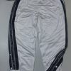 Champion baggy button type track pant size Xl

Waist 34-38
Length 44

Condition