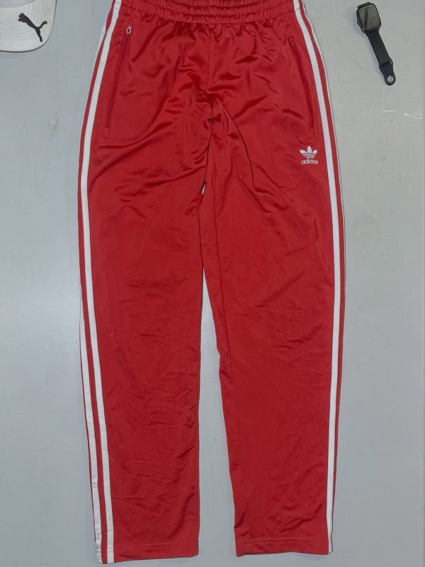 Adidas Red Track Pant Size S with down zipper 

Waist 26-28
Length 40 

Conditio