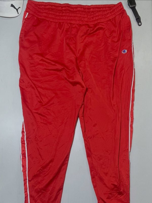Champion red XXl track pant condition 10/10

Waist 38-44
Length 41