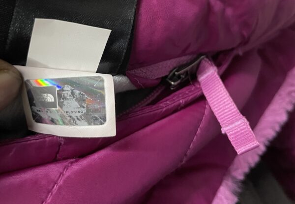 The north face puffer jacket thrift store