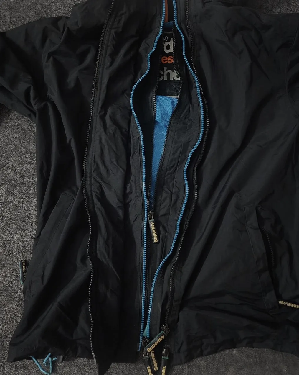 Superdry Professional Multi Chain Waterproof Windbreaker Jacket Black | M 7 thrift windbreakers india